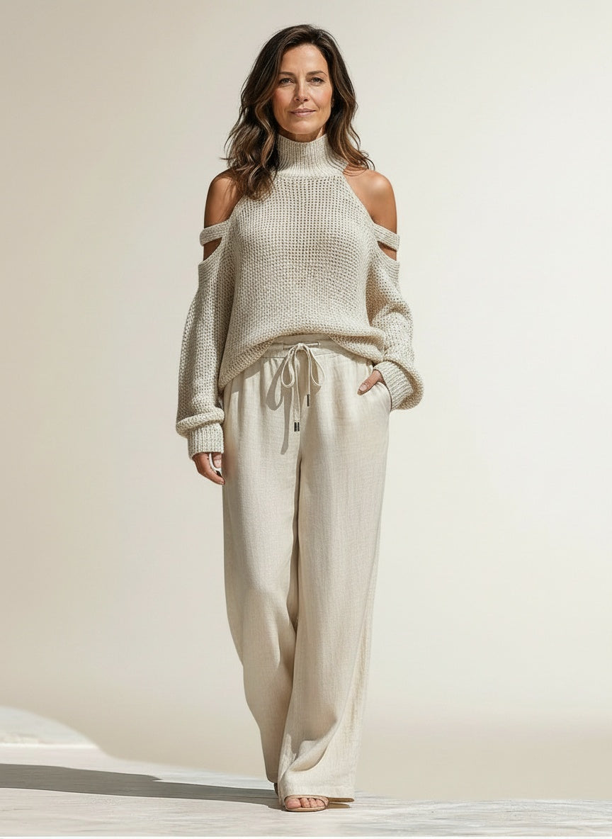 Full body view of the model wearing Zomerset met col en wijde broek voor dames – elegant en luchtig