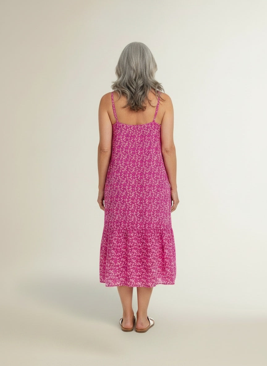 Back pose of the model wearing Midi-jurk met print en smalle bandjes voor dames – luchtig en zomers