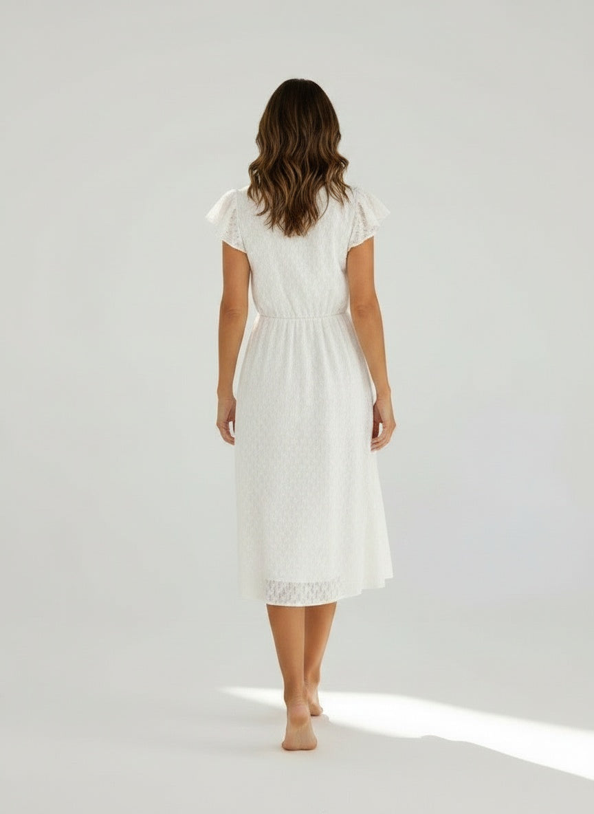 Back pose of the model wearing Midi zomerjurk met V-hals en korte mouwen met ruffles voor dames