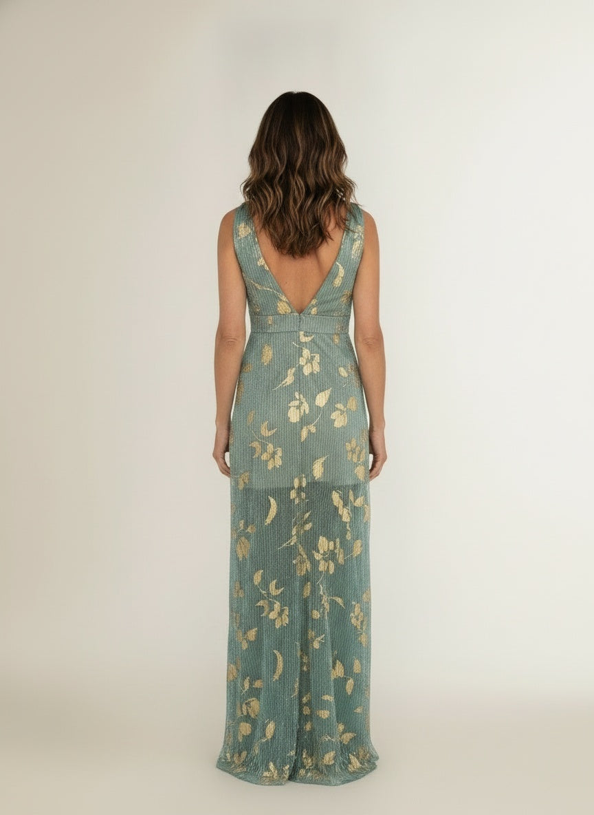 Back pose of the model wearing Mouwloze jurk met gouden sterrenprint en diepe V-hals voor dames